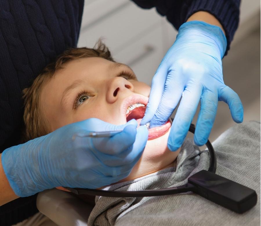 Kid in a orthodontic clinic for Orthodontic treatment
